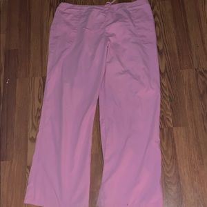 Pink scrub pants elastic waist and tie string.